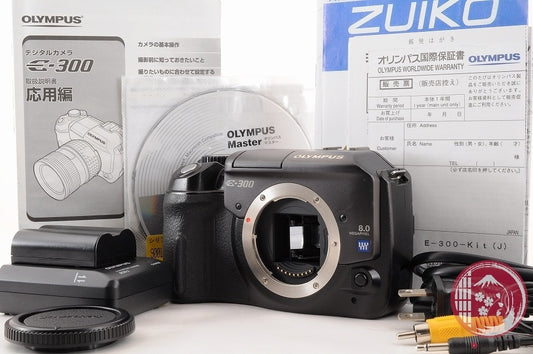 DDU READ [ 14630 shots MINT w/ Charger Cables] Olympus E-300 Japan Cj39
